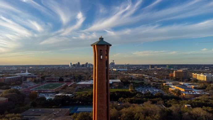 A drone shot of Trinity's campus in the evening with the Trinity Tower front and center.